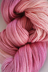 Close-up of Artyarns Merino Cloud Yarn in H Series, showcasing soft, fluffy Merino wool fibers and natural color variations.