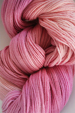 Close-up of Artyarns Merino Cloud yarn, soft and fluffy in a natural shade, showcasing the luxurious texture of Artyarns Merino Cloud.