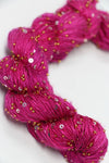 Artyarns Beaded Silk & Sequins Light beaded yarn with shimmering sequins and silk strands in a close-up view.