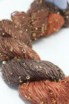 Beaded silk and sequins yarn from Artyarns' Beaded Silk & Sequins Light (H Series) with colorful beads and shimmering sequins.