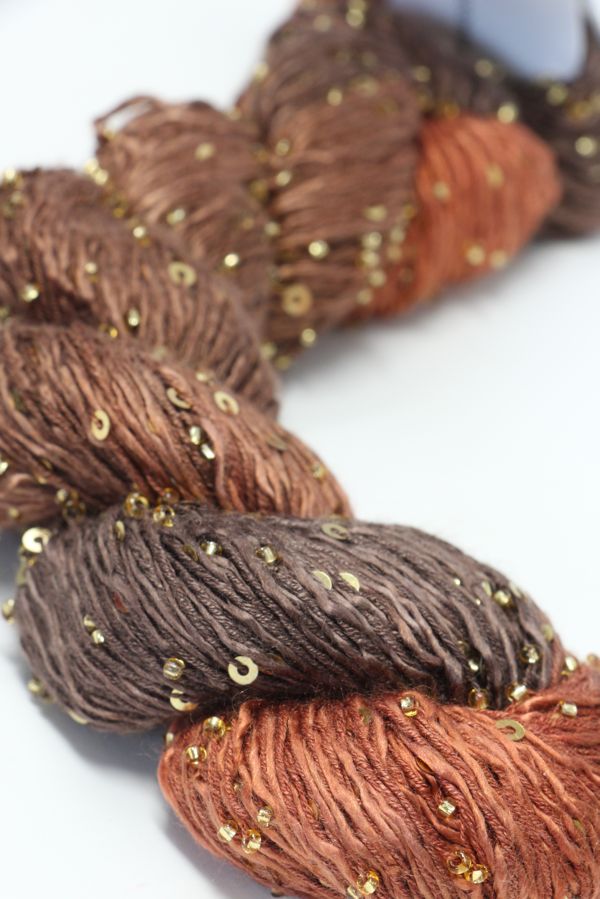 Beaded silk and sequins yarn from Artyarns' Beaded Silk & Sequins Light (H Series) with colorful beads and shimmering sequins.