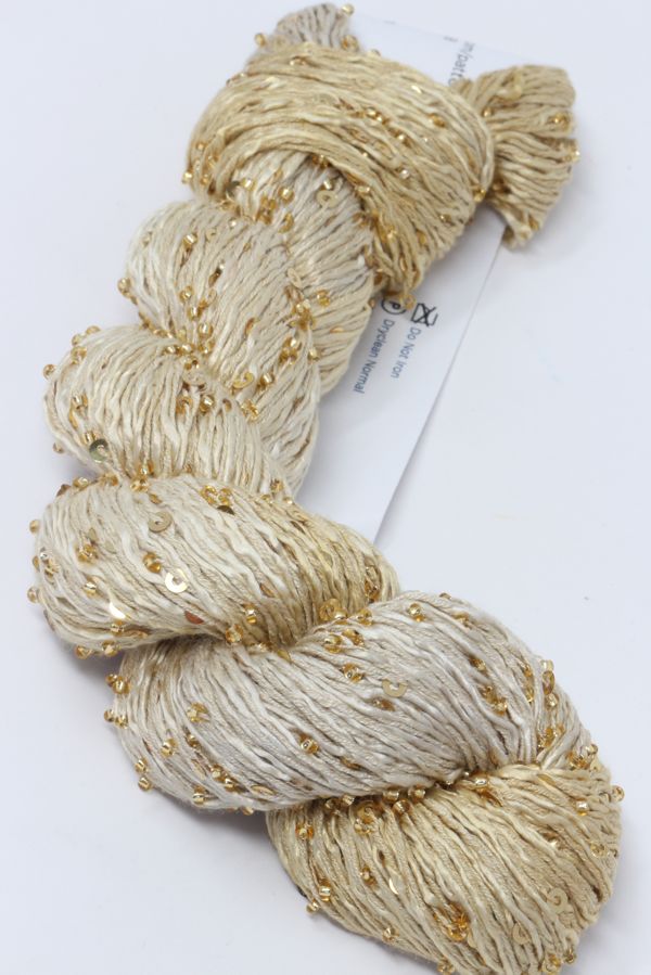 Artyarns Beaded Silk & Sequins Light beaded yarn with shimmering sequins and silk fibers in a close-up view.