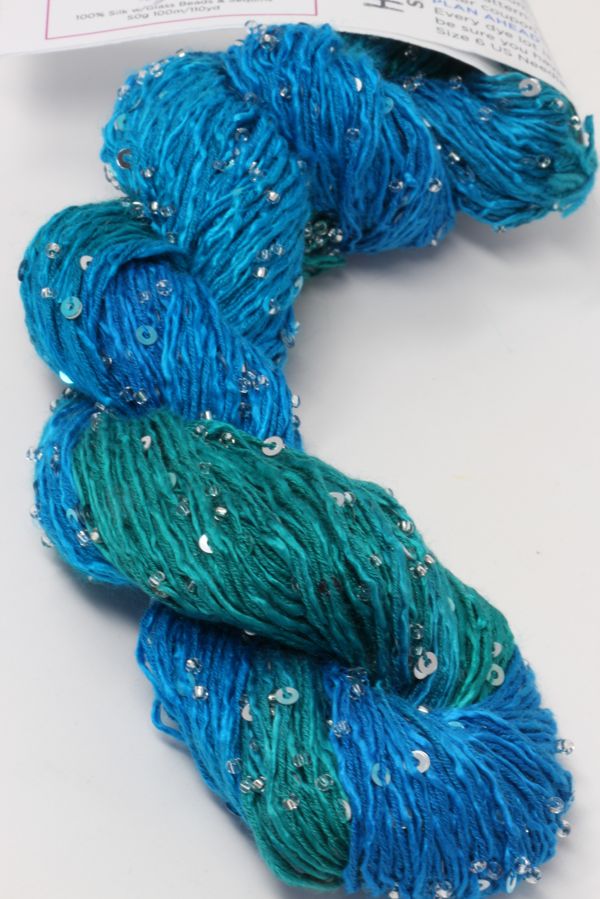 Beaded silk and sequins yarn from Artyarns' Beaded Silk & Sequins Light H Series in vibrant colors, showcasing intricate bead and sequin details.