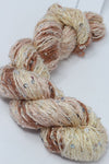 Beaded silk and sequins yarn from Artyarns' Beaded Silk & Sequins Light H Series, showing shiny beads and delicate silk strands.