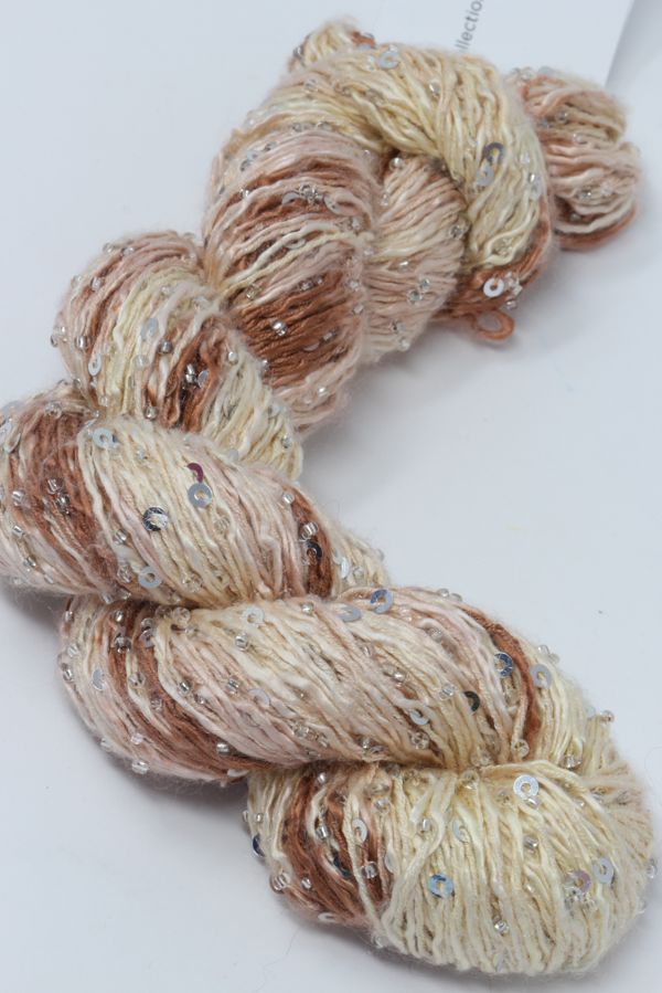 Beaded silk and sequins yarn from Artyarns' Beaded Silk & Sequins Light H Series, showing shiny beads and delicate silk strands.