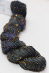 Beaded silk yarn with sequins from Artyarns' Beaded Silk & Sequins Light (H Series), showcasing shimmering beads and luxurious texture.