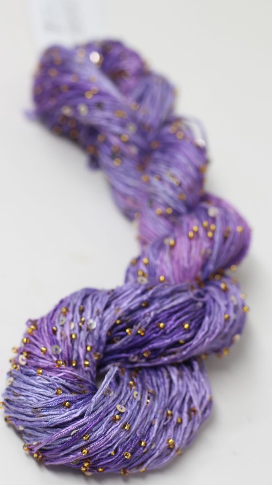 Beaded silk and sequins yarn from Artyarns' Beaded Silk & Sequins Light series, featuring shimmering beads and luxurious texture.