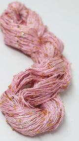 Beaded silk and sequins yarn by Artyarns, light H Series in color H37G1200, showcasing shimmering beaded texture and elegant design.