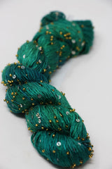 Beaded silk and sequins yarn by Artyarns, Light (H Series), featuring shimmering beads and sequins for elegant knitting or crochet projects.