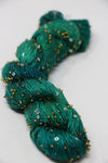 Beaded silk and sequins yarn by Artyarns, Light (H Series), featuring shimmering beads and sequins for elegant knitting or crochet projects.