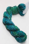 Beaded silk and sequins yarn from Artyarns' Beaded Silk & Sequins Light series, featuring shiny beads and elegant texture.