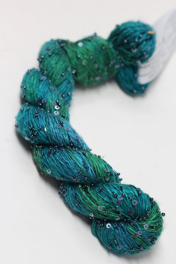 Beaded silk and sequins yarn from Artyarns' Beaded Silk & Sequins Light series, featuring shiny beads and elegant texture.