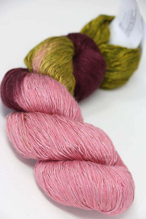 Soft Artyarns Ensemble Light cashmere yarn in F Series colors, showing vibrant, smooth strands suitable for luxurious knitting projects.
