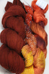 Artyarns knitting kit for a four triangle top with black and beaded sequins, includes yarns and instructions for knitting project.