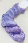 Soft silk yarn from Artyarns Silk Essence Lace collection, showcasing delicate, luxurious silk fibers in a neutral color.