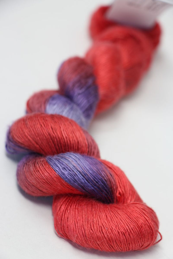 Close-up of Artyarns Silk Essence Lace silk yarn in a delicate, soft texture with subtle sheen, showcasing its fine craftsmanship.
