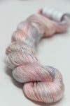 Close-up of Artyarns Silk Essence Lace silk yarn in soft, luxurious fibers, showcasing the delicate texture and elegant sheen.