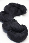 Soft, luxurious silk yarn from Artyarns Silk Essence Lace in a delicate lace pattern, showcasing its smooth texture and elegant sheen.