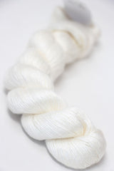 Close-up of Artyarns Silk Essence Lace silk yarn in a soft, shiny texture, showcasing its delicate and luxurious fiber quality.