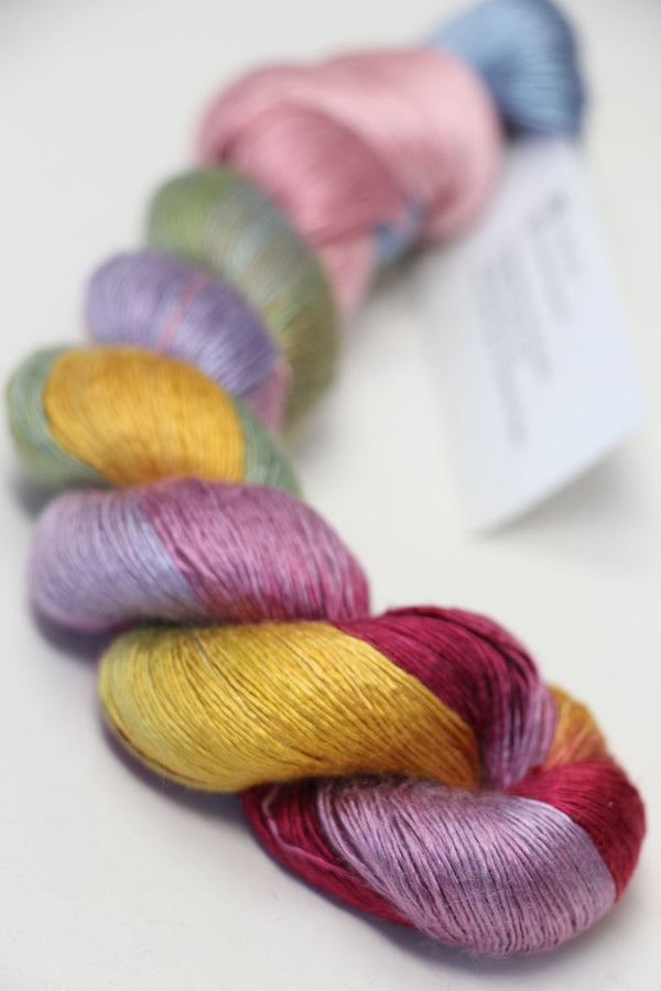 Fine Artyarns Silk Essence Lace silk yarn in soft, delicate strands, showcasing its luxurious texture and elegant sheen.