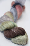 Soft silk yarn from Artyarns Silk Essence Lace collection, showcasing delicate, luxurious silk fibers in a neutral color.