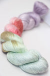 Close-up of Artyarns Silk Essence Lace silk yarn skein showing the soft, shiny silk fibers in a delicate lace texture.