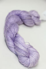 Close-up of Artyarns Silk Essence Lace silk yarn in soft, glossy strands, showcasing its luxurious texture and fine quality.