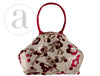 Black Atenti Betty handbag with bird design, stylish leather bag featuring a structured shape and top handle.