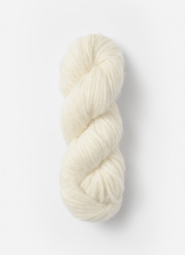Blue Sky Fibers Techno Alpaca, Silk, and Merino yarn in a soft blue color, showcasing the luxurious fiber blend and smooth texture.
