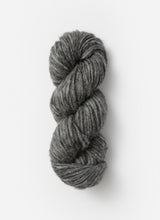 Blue Sky Fibers Techno Alpaca, Silk, and Merino yarn in a soft blue color, showcasing the fluffy, luxurious fiber texture.