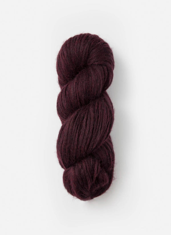 Blue Sky Fibers Techno Alpaca/Silk/Merino yarn in a soft blue color, showcasing the textured fiber blend and skein details.