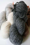 Blue Sky Fibers Techno Alpaca/Silk/Merino yarn in a bundle, showcasing soft, multicolored alpaca yarn with silk and merino blend.