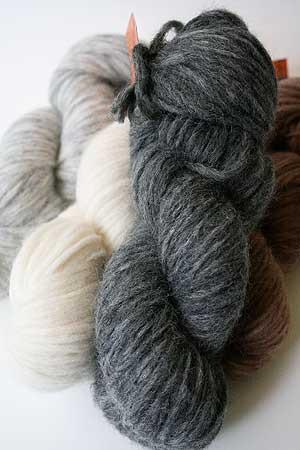 Blue Sky Fibers Techno Alpaca/Silk/Merino yarn in a bundle, showcasing soft, multicolored alpaca yarn with silk and merino blend.