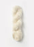 Blue Sky Fibers Brushed Suri alpaca yarn in soft blue color, showing thick, plush spun fiber with a smooth texture.