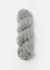 Blue Sky Fibers Brushed Suri alpaca yarn in soft blue color, showing the fluffy, textured skein with a gentle sheen.