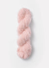 Blue Sky Fibers Brushed Suri alpaca yarn in soft, brushed blue color, showcasing the textured fiber and smooth strands.