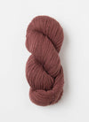Blue Sky Fibers Extra Alpaca Merino aran yarn skein in soft blue color, showcasing the smooth, textured fiber.