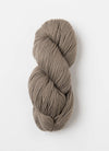 Blue Sky Fibers Extra Alpaca Merino Aran yarn in soft blue, showing a close-up of the textured, spun alpaca and merino wool fibers.