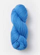 Blue Sky Fibers Extra Alpaca Merino aran yarn in soft blue, showing thick and cozy wool fibers suitable for knitting and crochet projects.