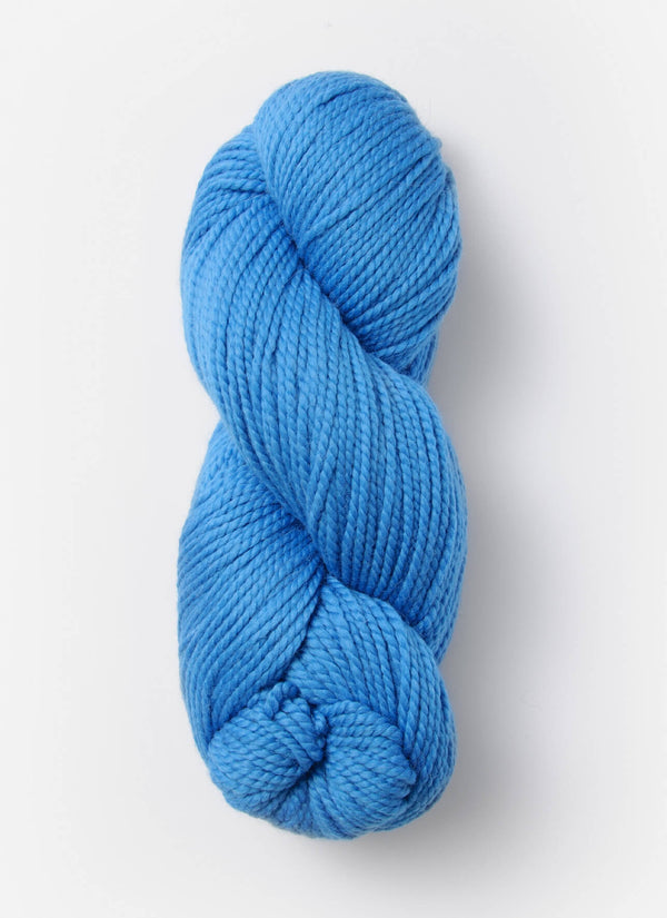 Blue Sky Fibers Extra Alpaca Merino aran yarn in soft blue, showing thick and cozy wool fibers suitable for knitting and crochet projects.