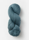 Blue Sky Fibers Extra Alpaca Merino Aran yarn in soft blue, showing thick, cozy alpaca wool skein with a smooth texture.
