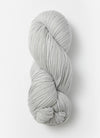 Blue Sky Fibers Extra Alpaca Merino aran yarn in soft blue, showing thick, cozy wool with a smooth texture.