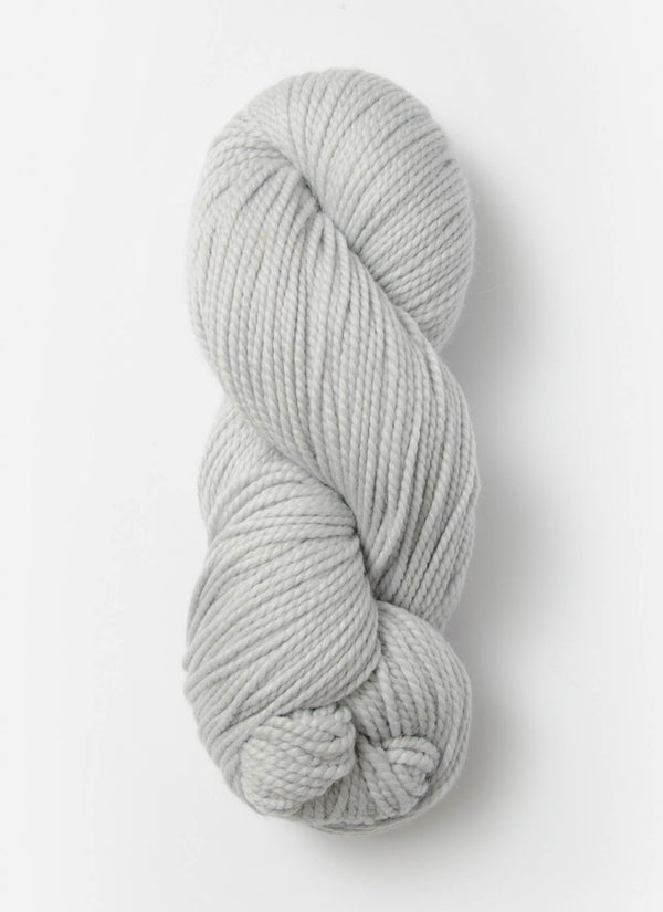 Blue Sky Fibers Extra Alpaca Merino aran yarn in soft blue, showing thick, cozy wool with a smooth texture.