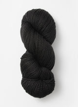 Blue Sky Fibers Extra Alpaca Merino aran yarn in soft blue, showing thick, cozy textured alpaca and merino wool fibers.
