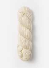Blue Sky Fibers Suri Merino alpaca and merino yarn in soft blue, showcasing its smooth, plush texture and vibrant color.