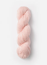 Blue Sky Fibers Suri Merino alpaca and merino yarn in natural blue hue, showcasing soft, luxurious fiber strands.
