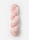 Blue Sky Fibers Suri Merino alpaca and merino yarn in natural blue hue, showcasing soft, luxurious fiber strands.