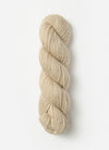 Blue Sky Fibers Suri Merino alpaca yarn in soft blue, showcasing the smooth, luxurious fiber with a close-up of the spun strand.