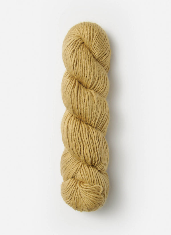 Blue Sky Fibers Suri Merino alpaca and merino yarn in soft blue color, showcasing the textured, high-quality fiber.