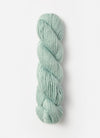 Blue Sky Fibers Suri Merino alpaca and merino yarn in soft blue, showing its smooth texture and luxurious fiber blend.
